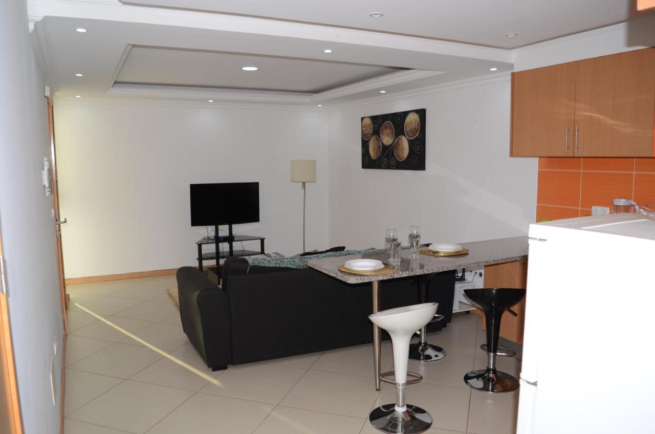 Apartamento Terra Branca Praia Bagian luar foto